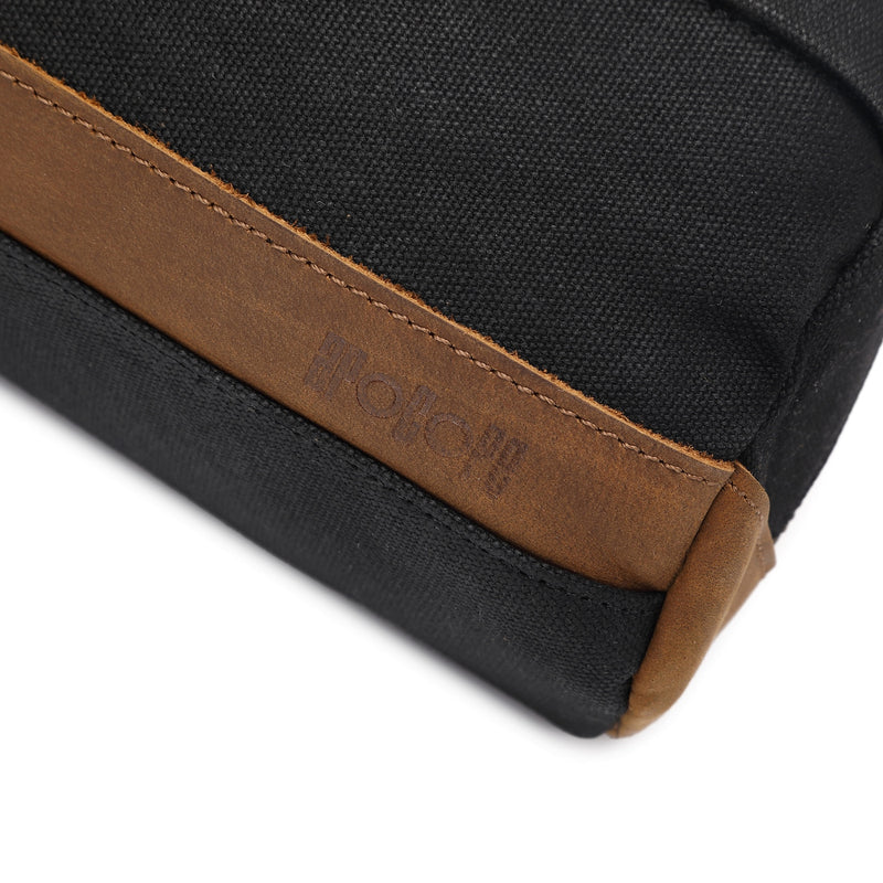 TONY - Trousse de toilette en cuir véritable et toile enduite - Noir